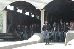 Philippi soldiers in two separate groups, they appear to be marching