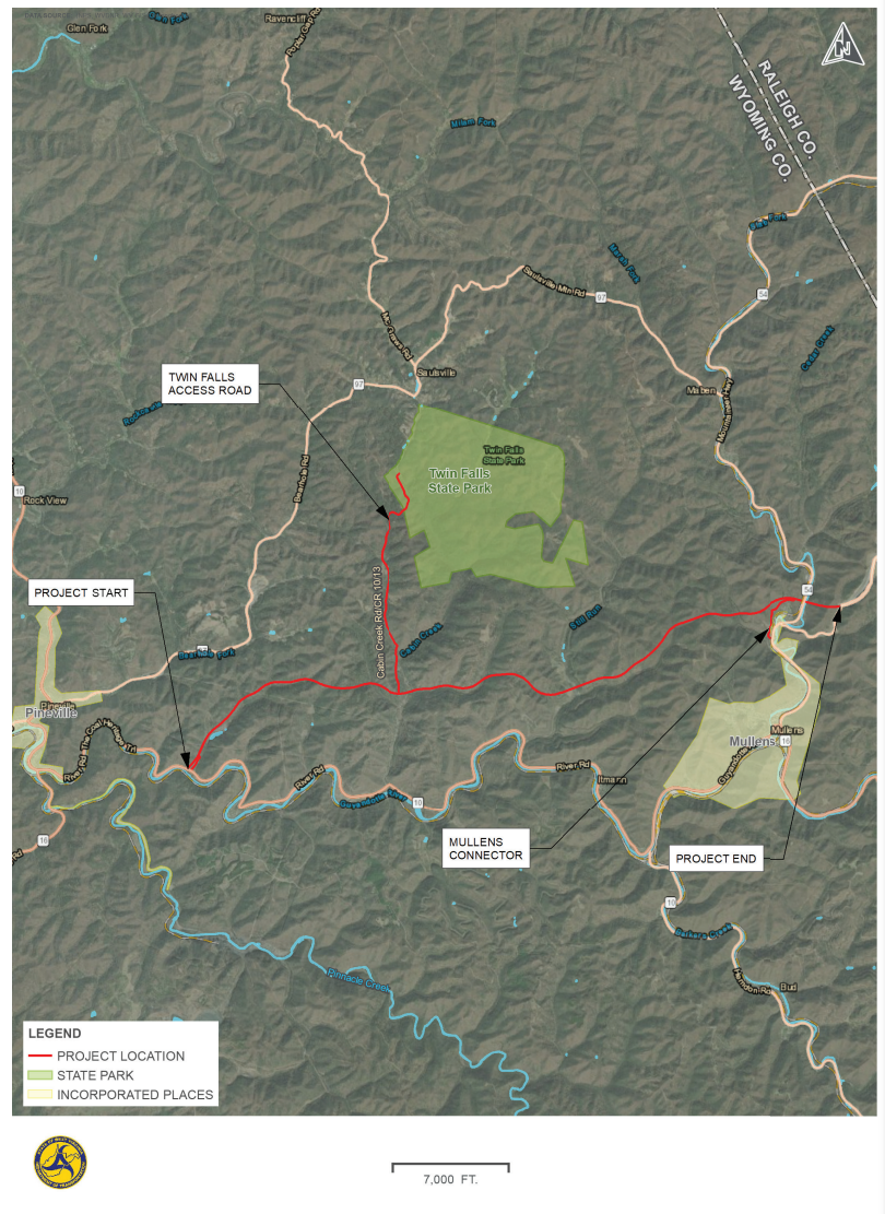 An aerial map of the Coalfields Expressway project in Wyoming County, West Virginia, showing the highlighted project route stretching from near Pineville to Mullens, including the Twin Falls Access Road leading toward Twin Falls State Park and the Mullens Connector
